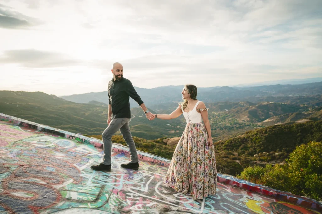 Engaged Couple Holding Hands at Sunset at Topanga Overlook