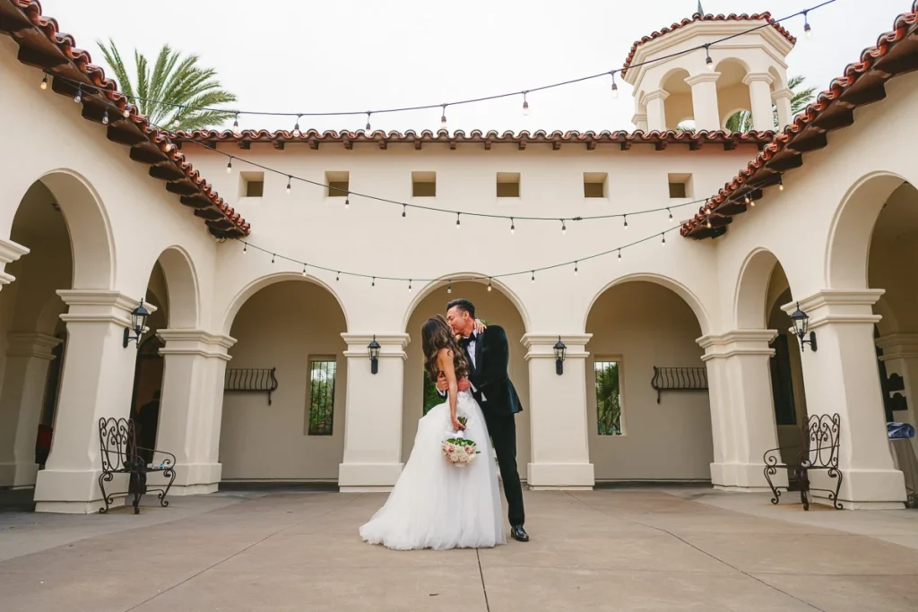 Bride and Groom pose for a portrait at talega golf club
